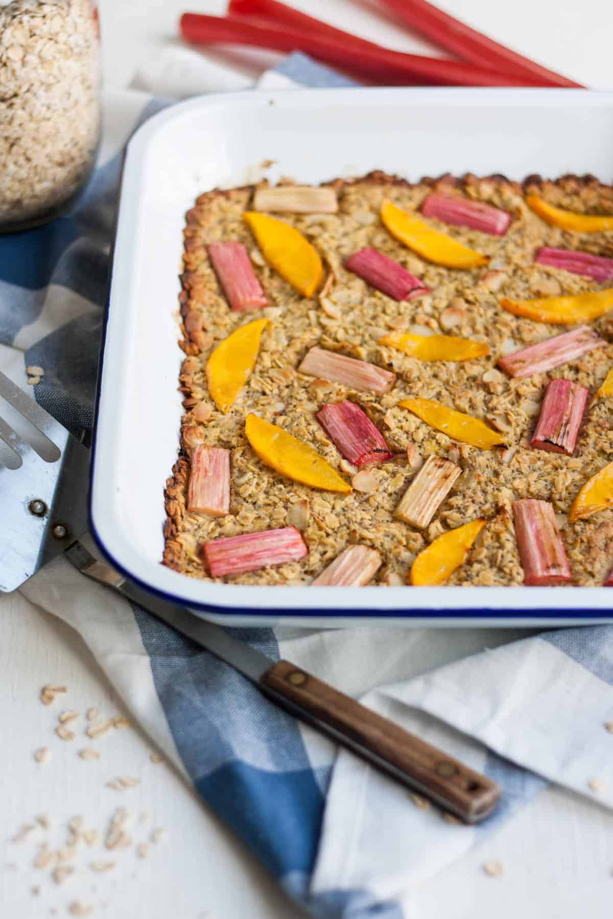 Rhubarb and Mango Baked Oatmeal - this naturally sweetened vegan breakfast dish is bright and fruity and will keep you full until lunchtime! | eatloveeats.com