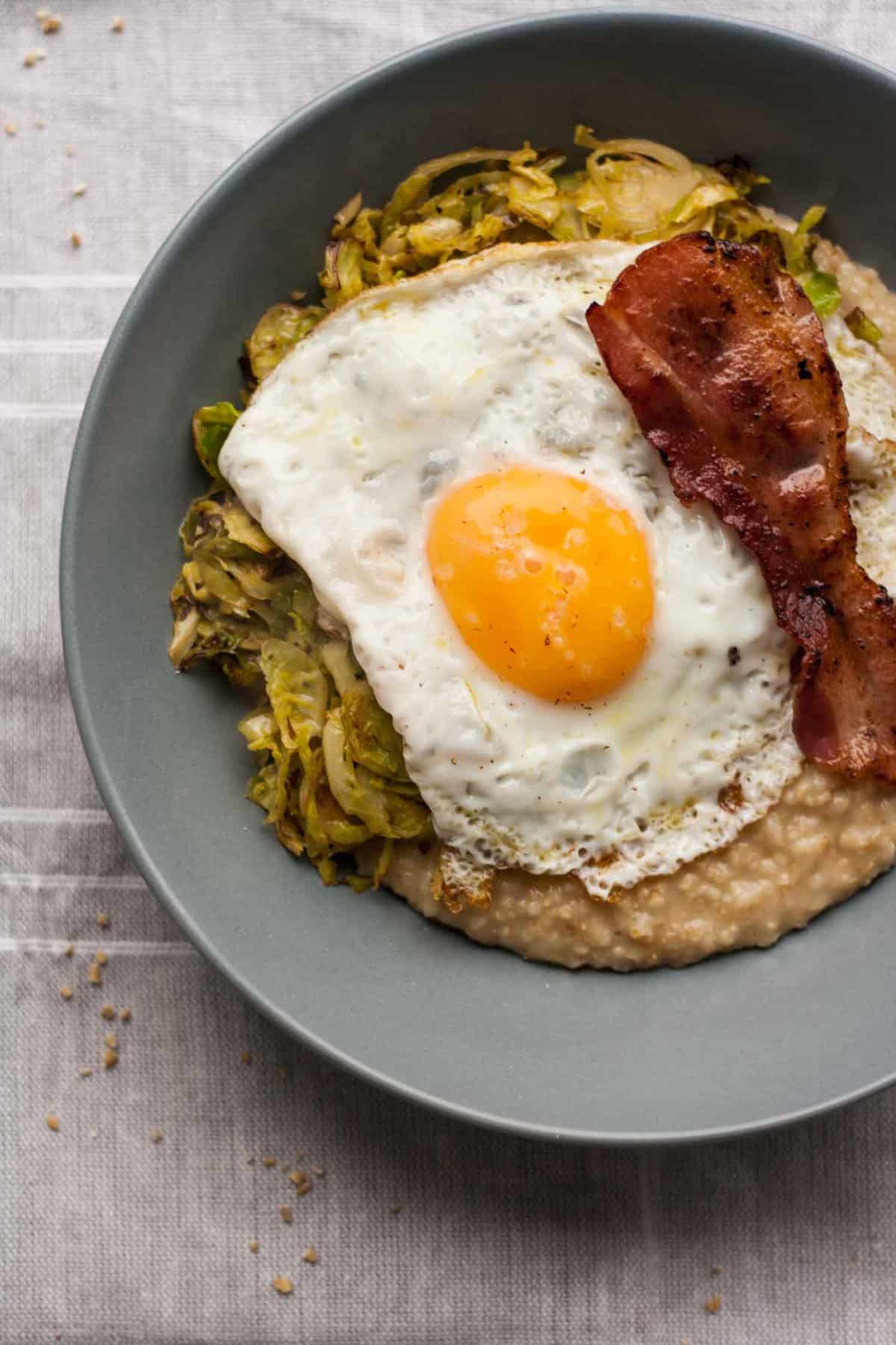 Savoury Porridge with Brussels Sprouts - this savoury oatmeal recipe is the perfect easy comfort food that is ready in less than half an hour! | eatloveeats.com