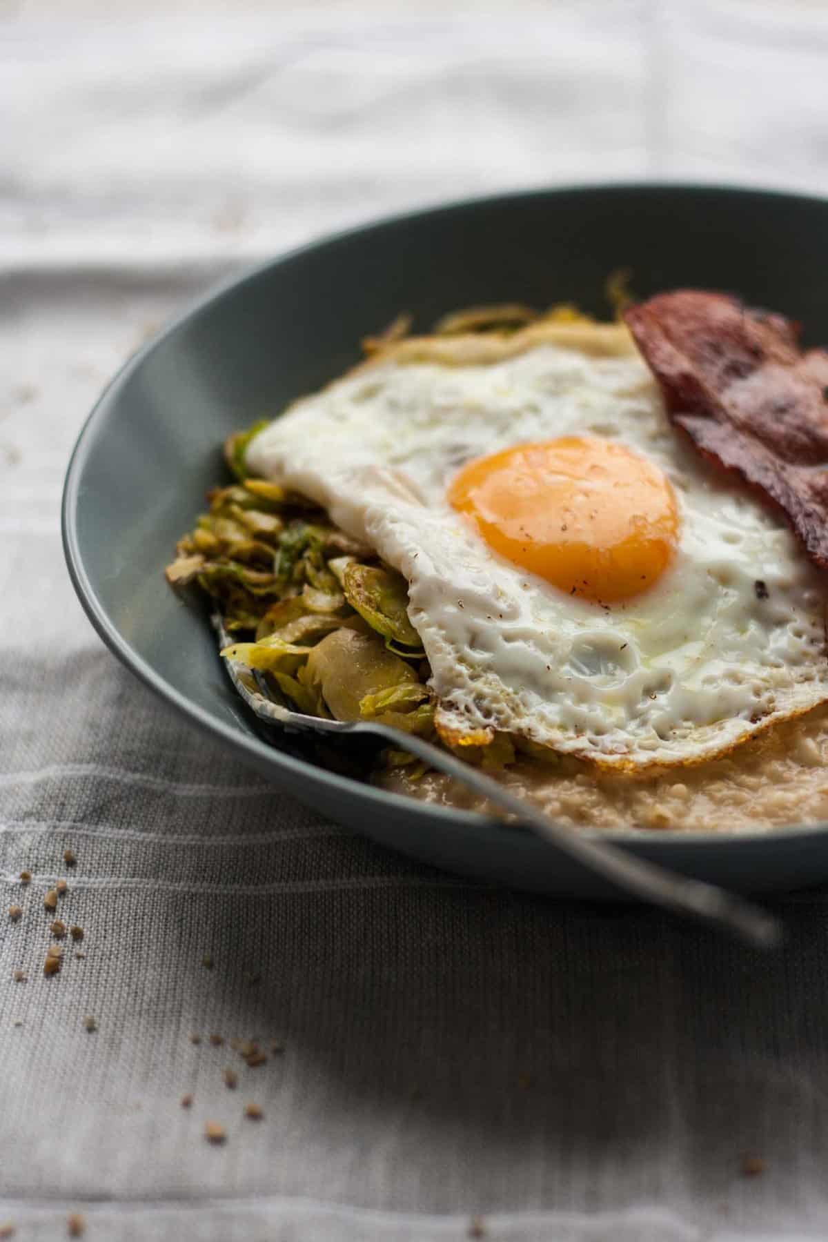 Savoury Porridge with Brussels Sprouts - this savoury oatmeal recipe is the perfect easy comfort food that is ready in less than half an hour! | eatloveeats.com