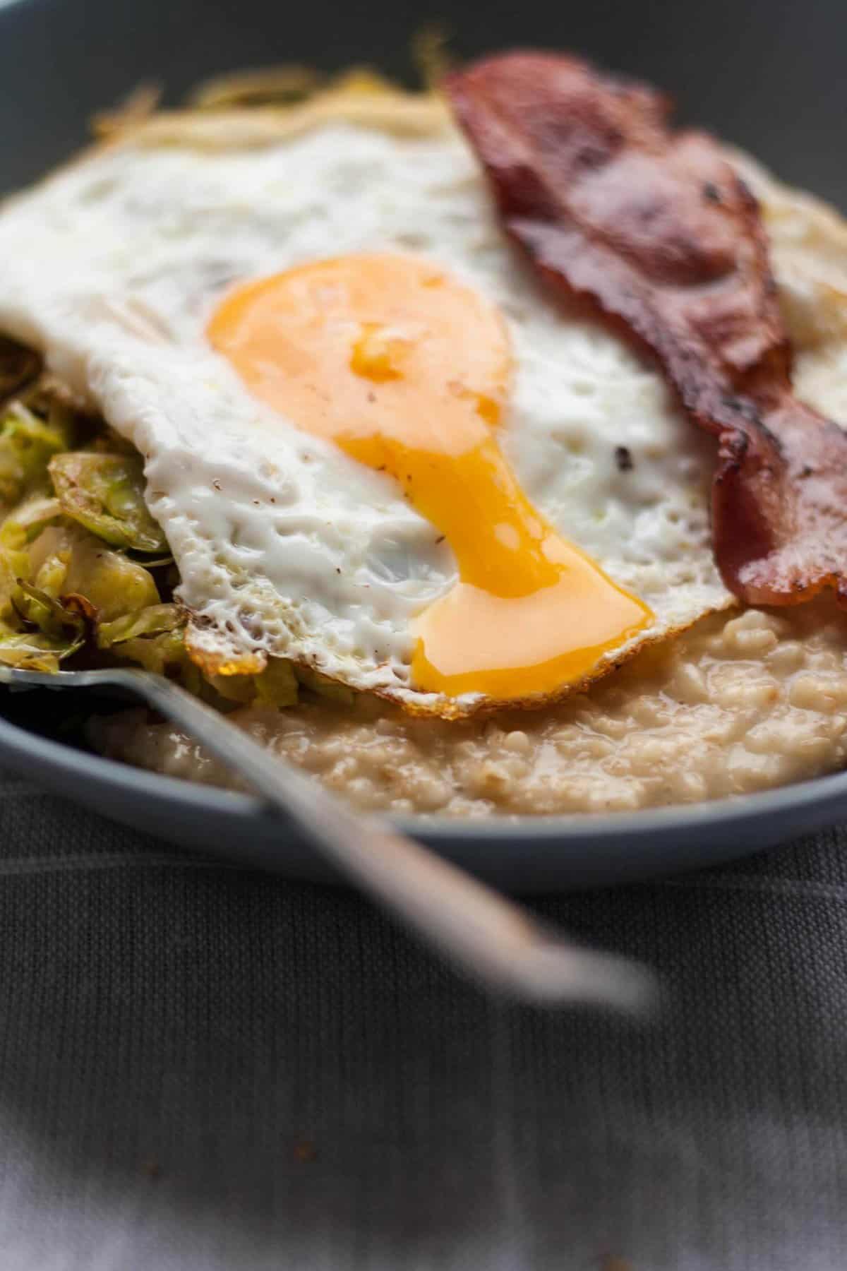 Savoury Porridge with Brussels Sprouts - this savoury oatmeal recipe is the perfect easy comfort food that is ready in less than half an hour! | eatloveeats.com