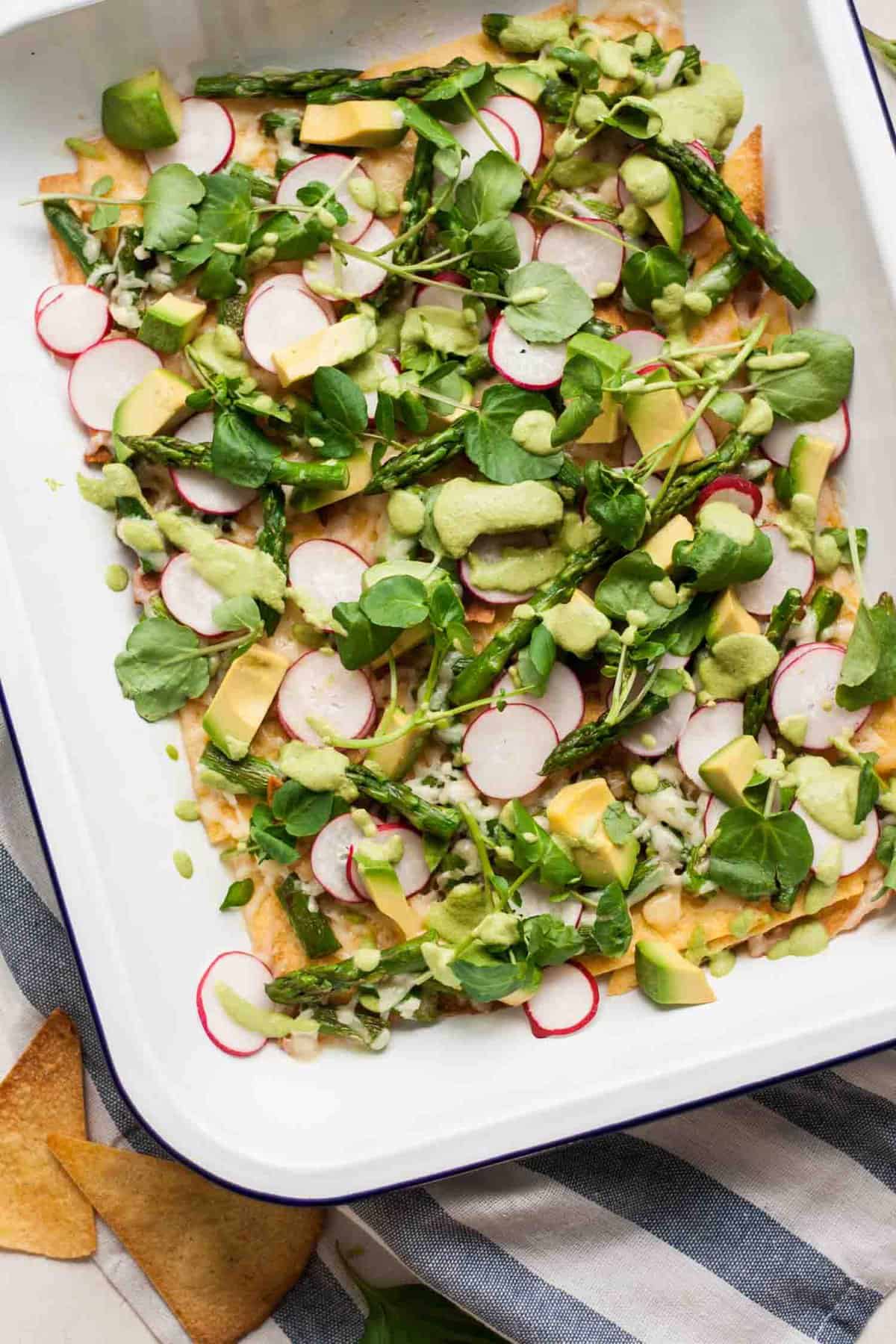 A close up of healthy asparagus vegan nachos. 