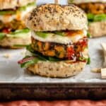 blackened salmon sliders on a baking sheet lined with parchment paper.