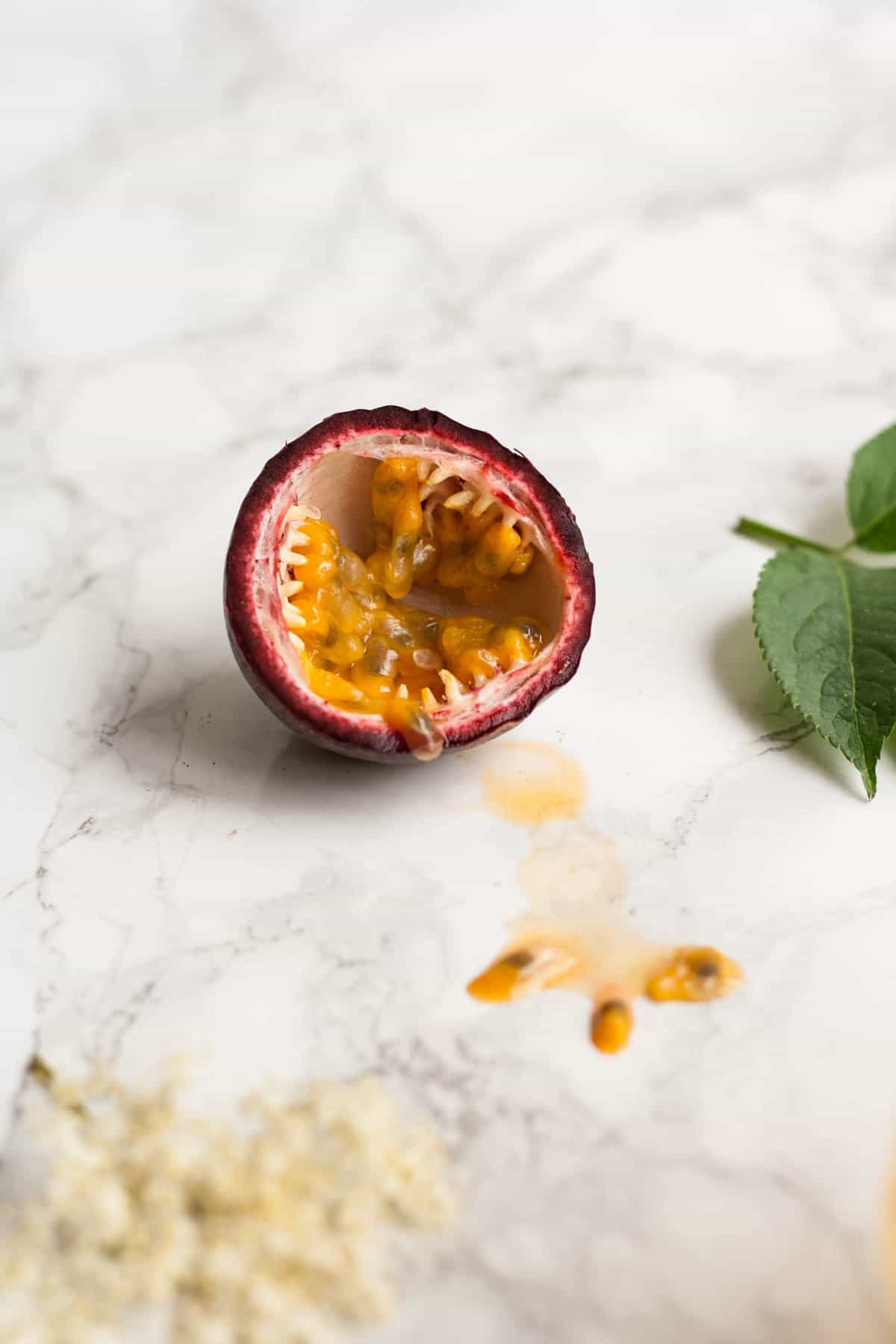 Passionfruit and Elderflower Fizz - a fruity and fragrant drink that's perfect for summer and so quick to make! | eatloveeats.com