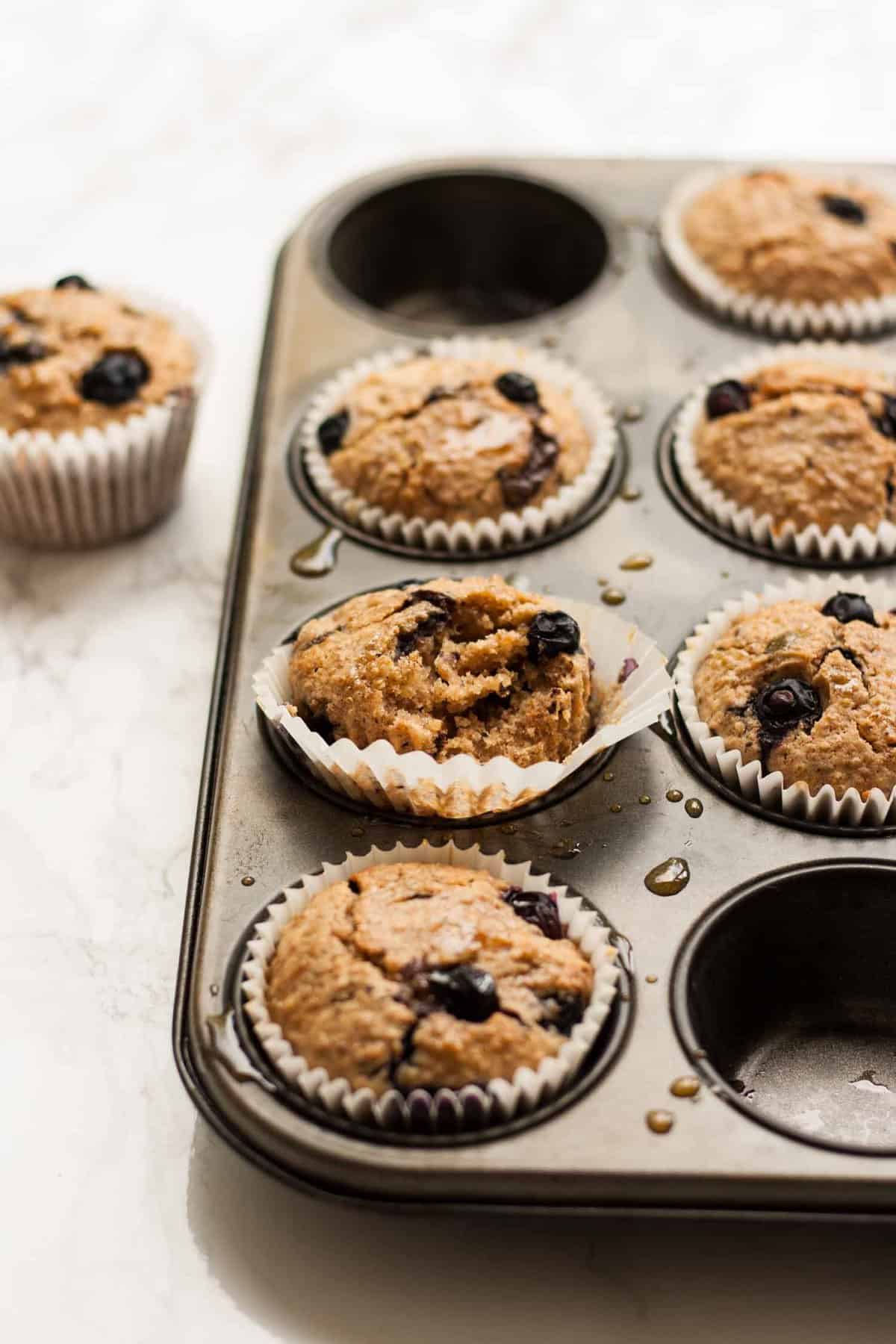 Quinoa Spelt Blueberry Breakfast Muffins - these easy breakfast muffins are full of goodness and taste amazing with a drizzle of warmed maple syrup! | eatloveeats.com