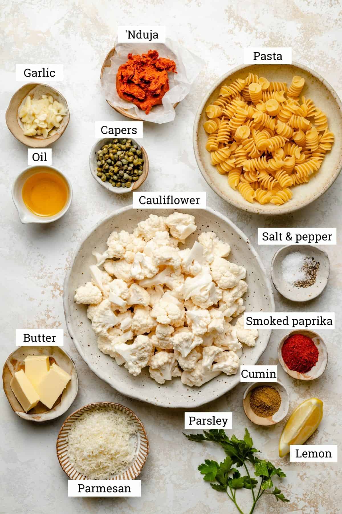 Ingredients for nduja pasta recipe in various bowls.