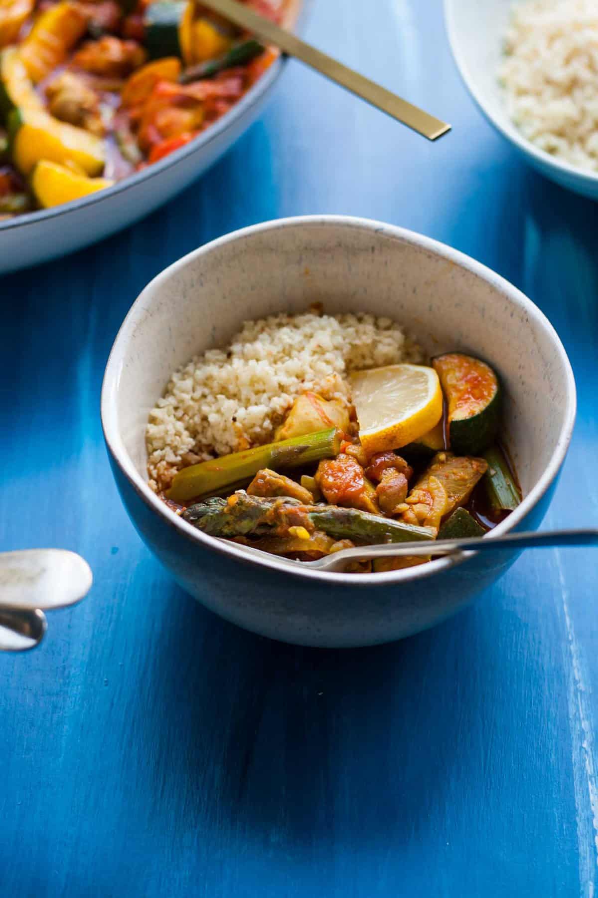 Spring Vegetable Chicken Tagine - this vibrant spiced chicken stew is richly flavoured and packed full of green spring vegetables | eatloveeats.com