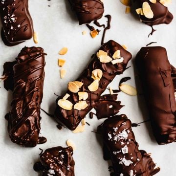 An array of caramel chocolate bars on a table.