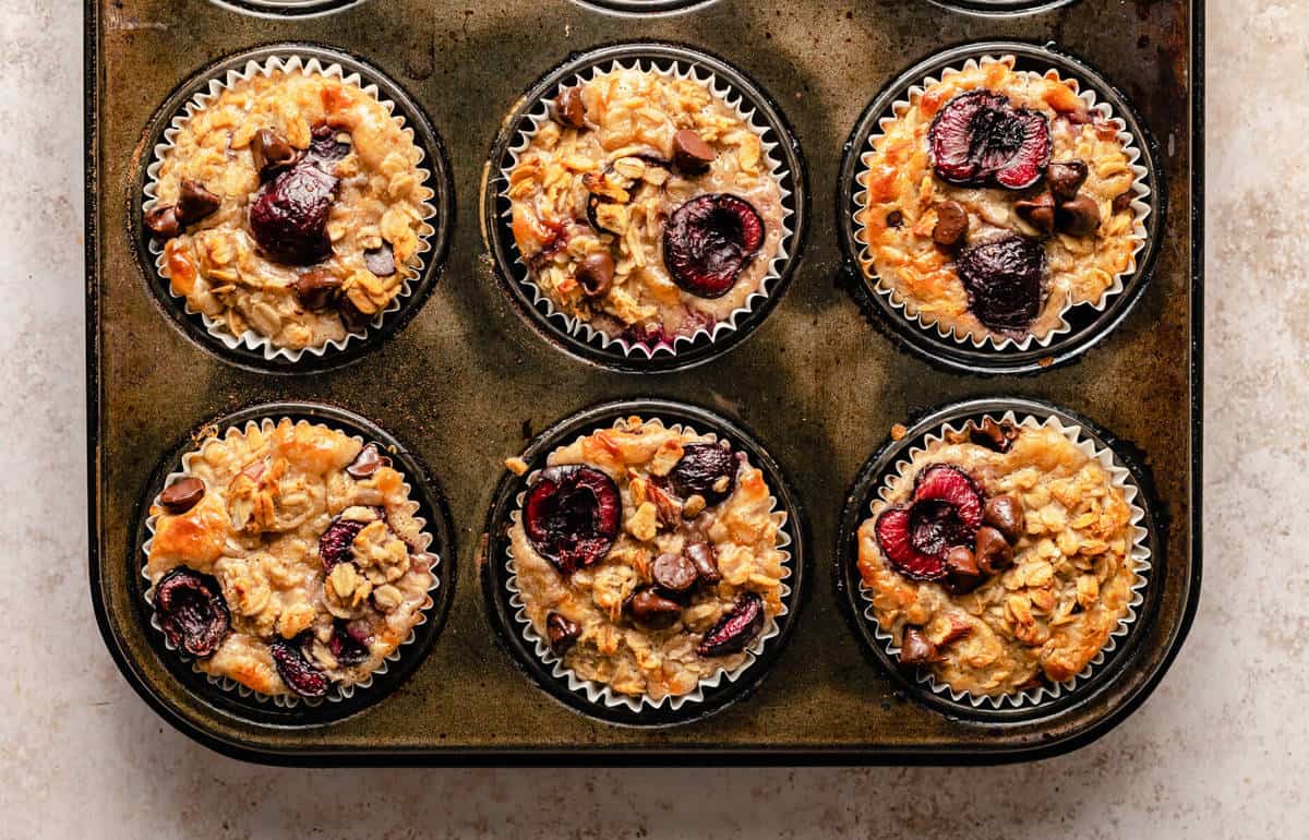 Baked oatmeal cups in a muffin tin.