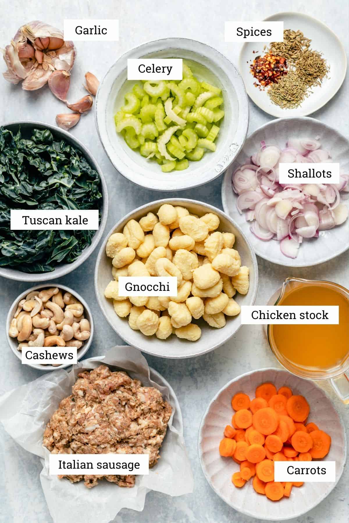 Ingredients in various bowls on a marble work surface.