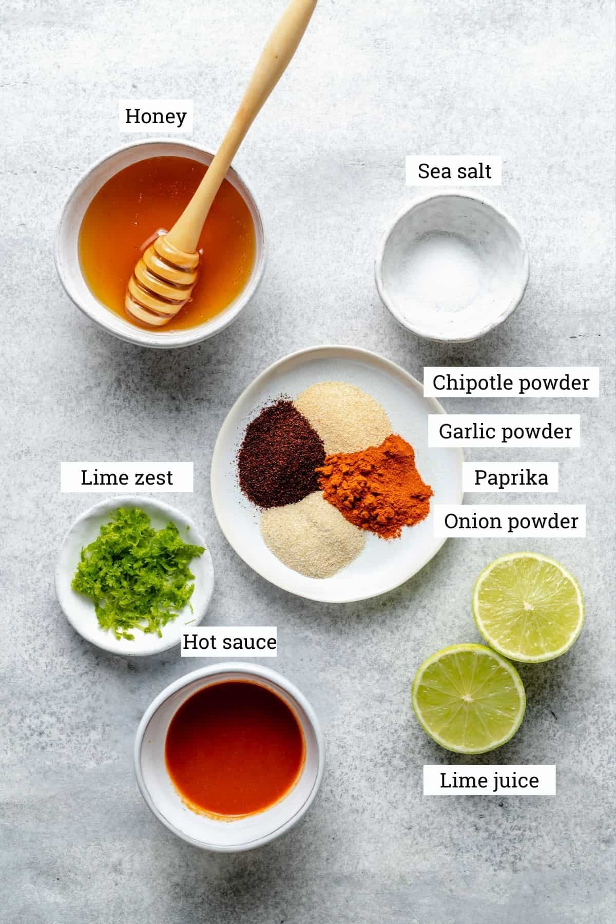 Ingredients for chipotle lime sticky sauce in various bowls. 