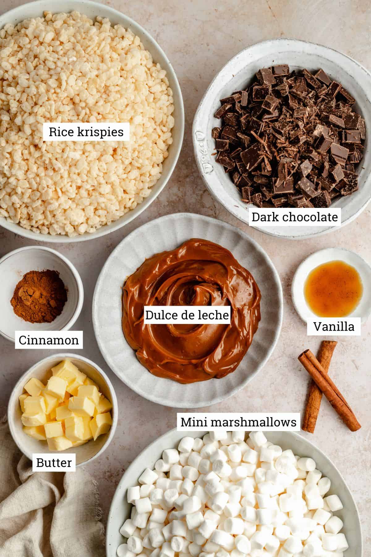 Ingredients in various bowls on a warm work surface.