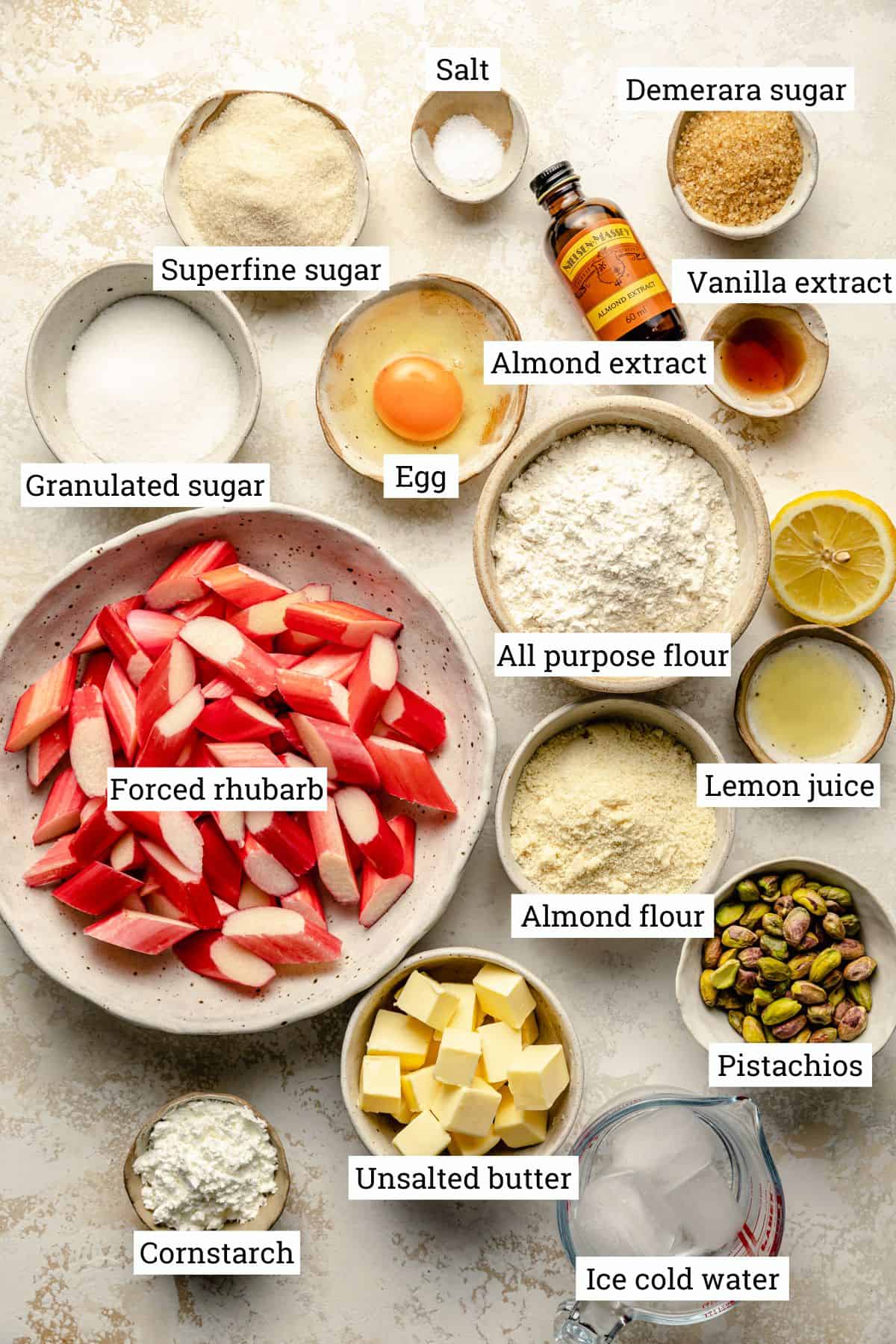 Ingredients in various bowls with labels.