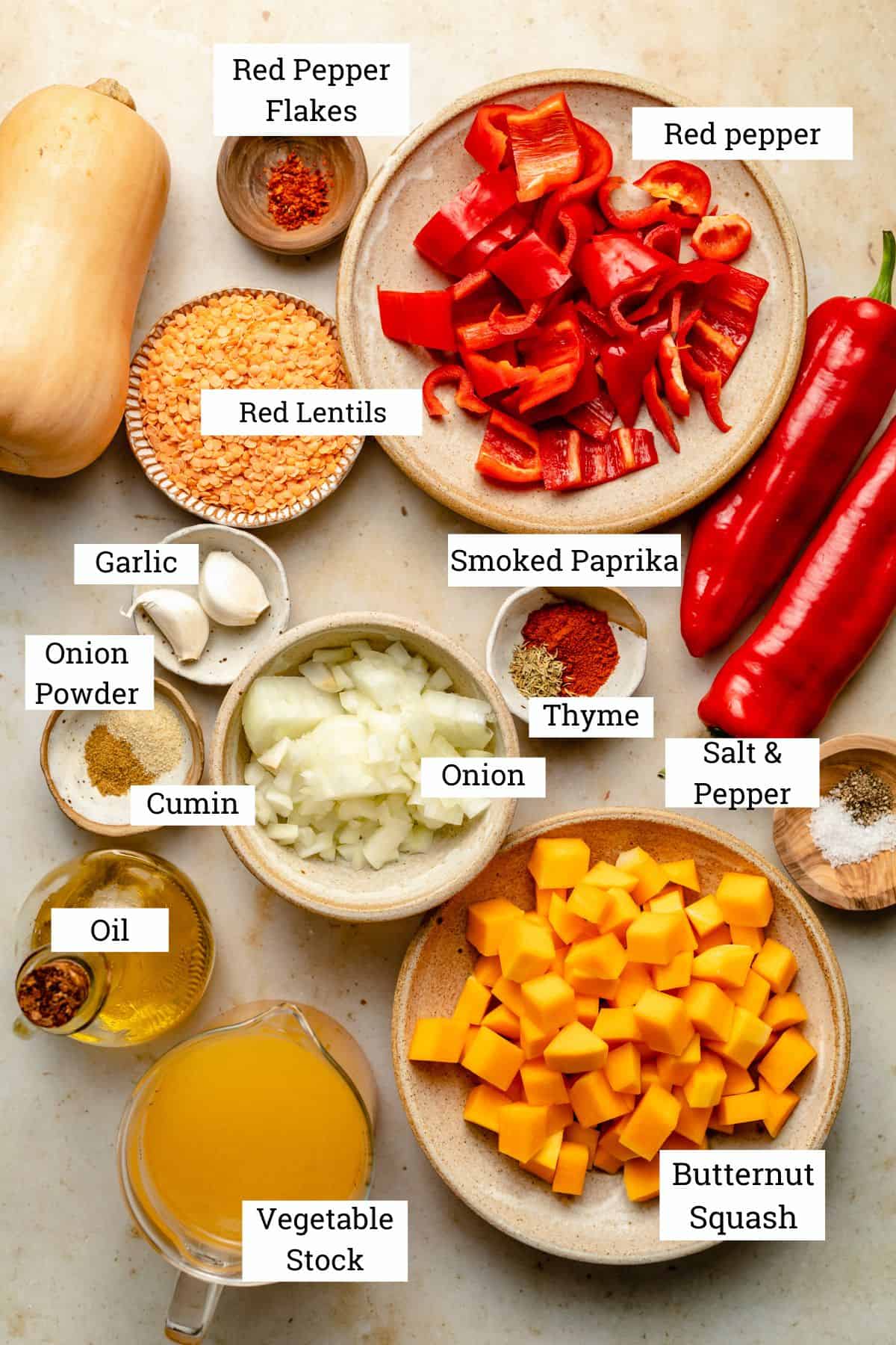 Butternut squash and red pepper soup ingredients in bowls with labels.