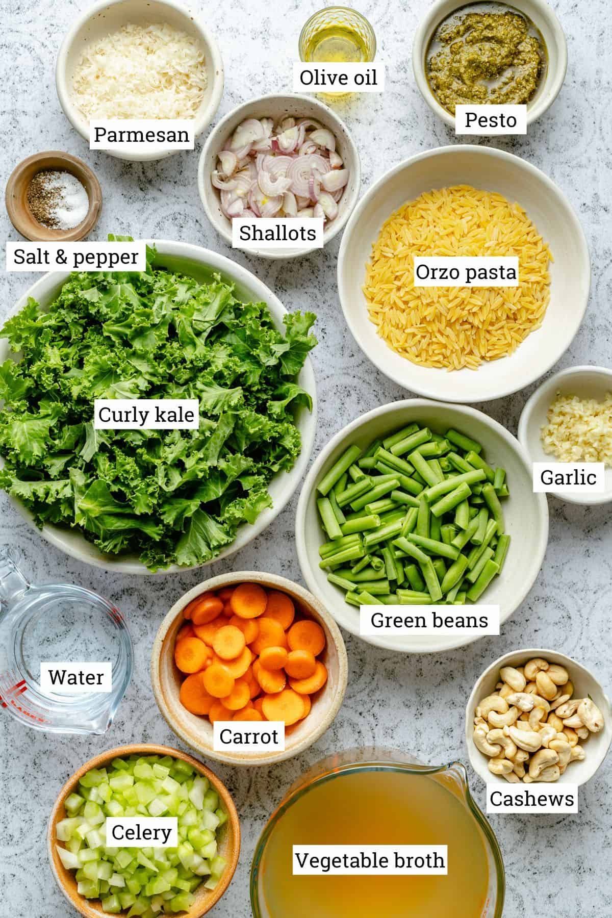 Ingredients in various bowls and jugs with labels.